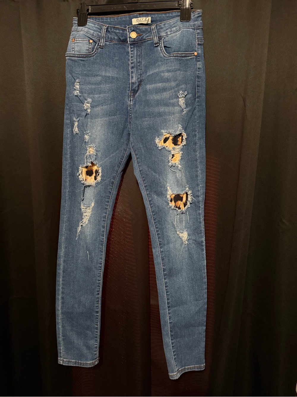 New with Tags. Distressed Blue Skinny Jeans with Leopard Patch Detail